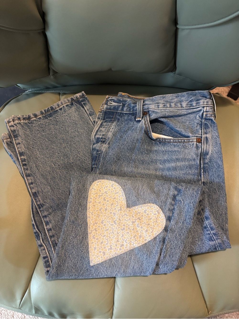 Levi’s High-Rise Jeans with Heart Patch